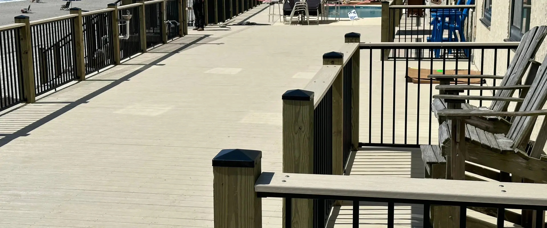 Oceanfront deck and railings beside the pool at Horizon East