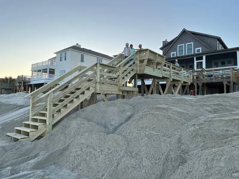 Timber beach access stairs and walkover built across a dune