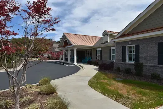 Sidewalk leading to the covered entrance at Inlet Coastal Resort
