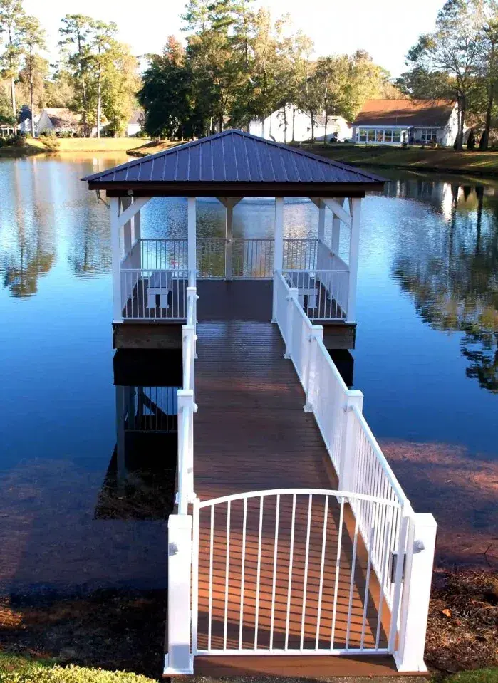 Covered pierhead and wooden walkway at Blackmoor in Murrells Inlet