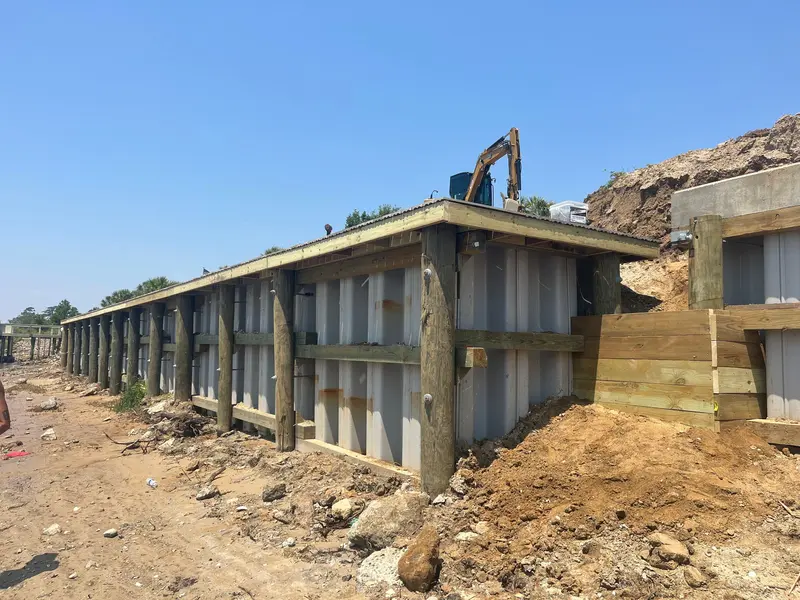 Vinyl seawall and timber cap work in progress at Grande Dunes