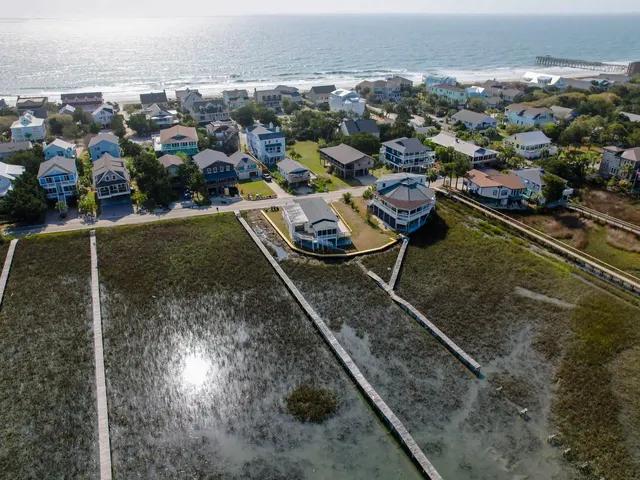 Aerial view of a completed vinyl bulkhead protecting a Pawleys Island home