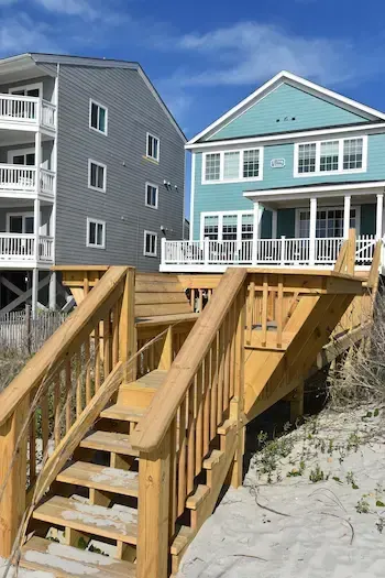 House-side stairs and timber railings at the Surfside Beach walkway